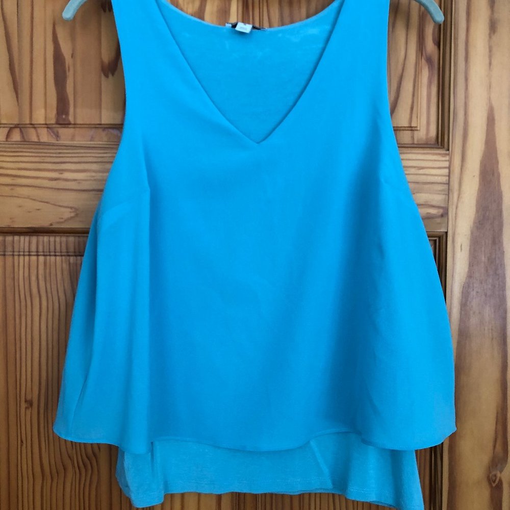 Pale aqua sleeveless blouse